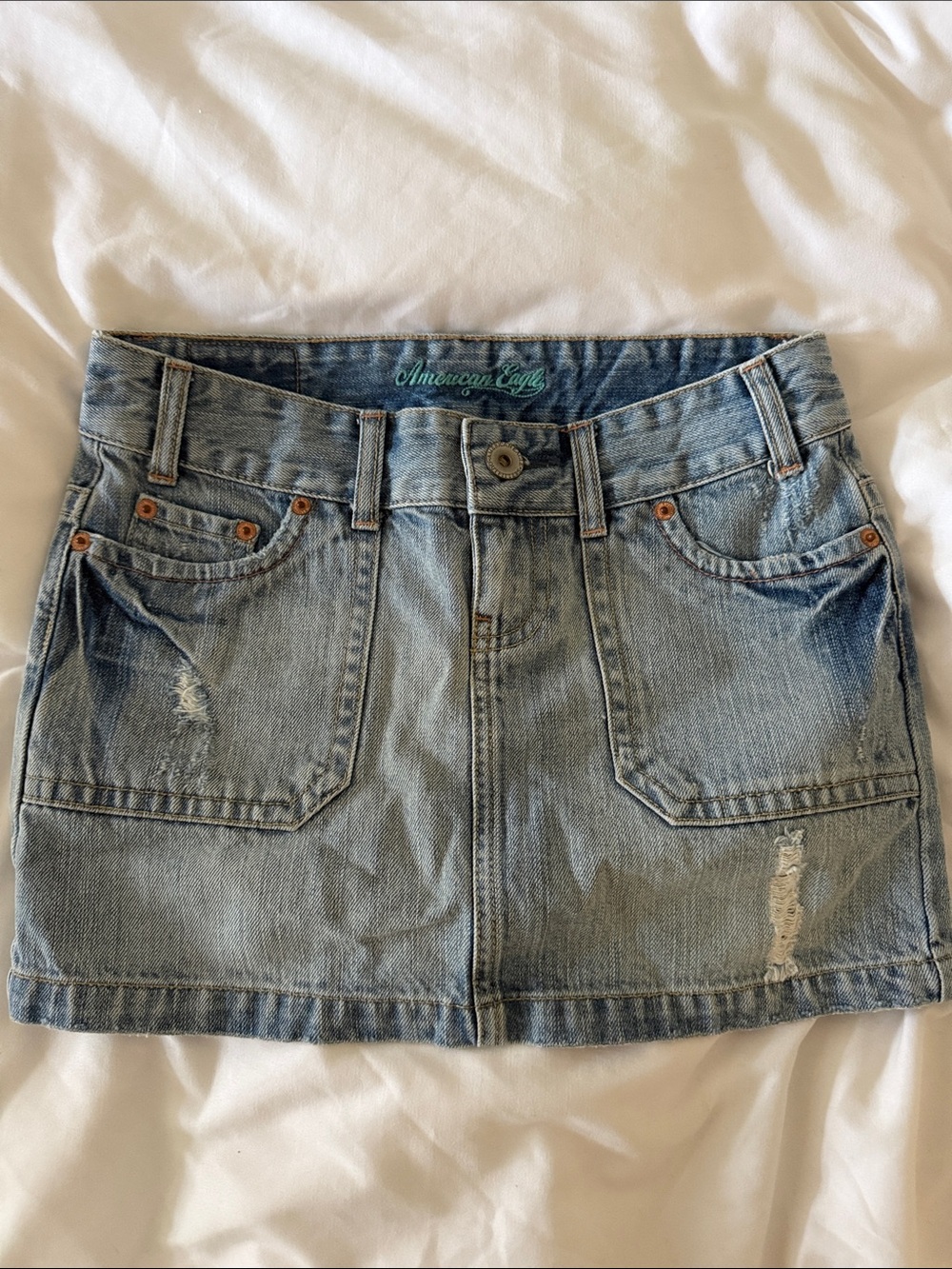 American Eagle Outfitters faded blue denim mini skirt